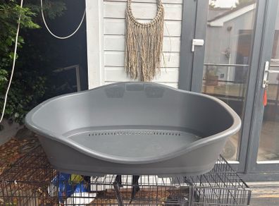 dog cage and bed