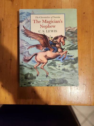 The Chronicals Of Narnia Compilation.  2 Books In Presentation Folder. Large Volume Hardback In Very Good Condition.