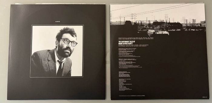 Eels - Perform The Cautionary Tales of Mark Oliver Everett. Double Deluxe LP Release on clear vinyl. Played once and good as new.