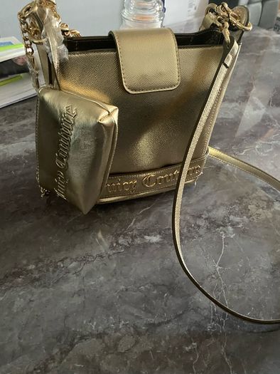 Juicy Couture gold handbag