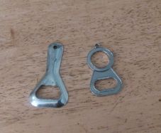2 Bottle Openers for a euro
