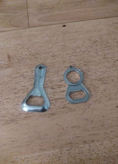 2 Bottle Openers for a euro