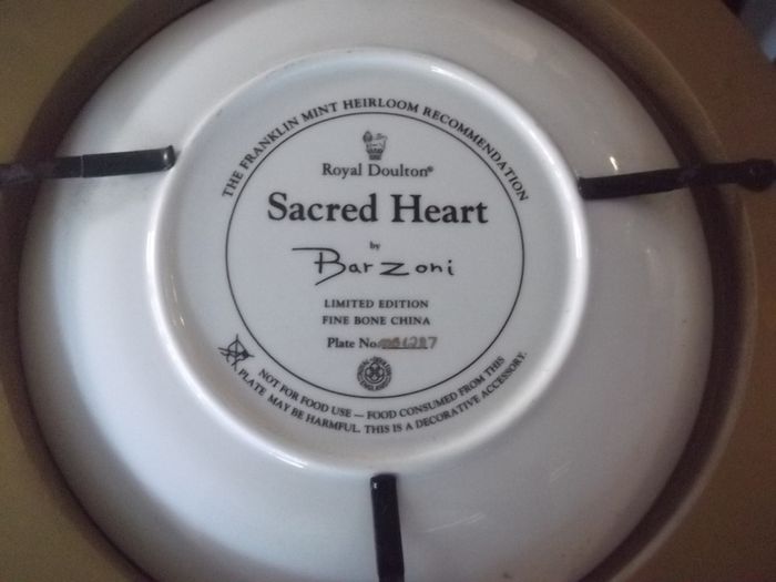 a royal doulton sacred heart plaque