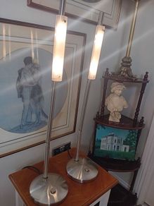 A pair of metal chrome table lamps