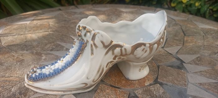 Antique porcelain shoe "For a Good Boy," turn of the 20th century.