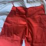Dunnes red trousers Image 2
