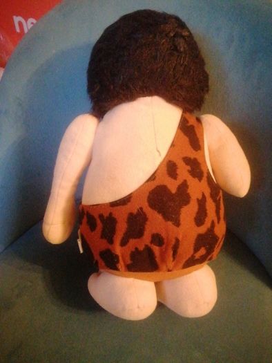 vintage caveman plush toy