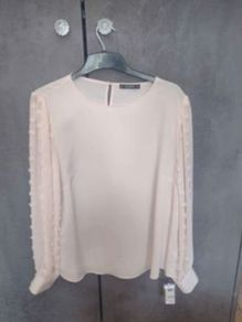 woman's ivory blouse.  New