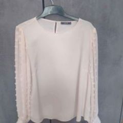 woman's ivory blouse.  New