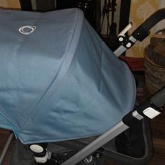Bugaboo cameleon with footmuff, rain cover and basket