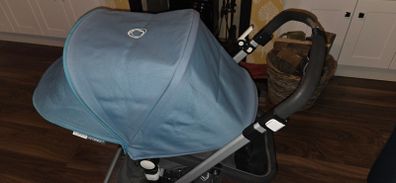 Bugaboo cameleon with footmuff, rain cover and basket
