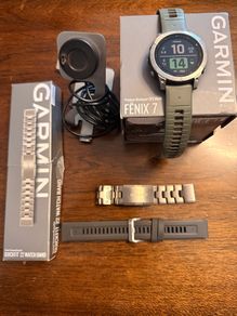 Garmin Fenix 7 with extra straps and charging mount