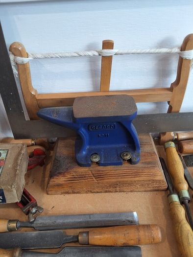 anvil on timber stand