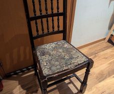 Five wooden dining chairs