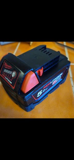 2 x Milwaukee M18 5Ah Batteries with Milwaukee M12-18 FC 12/18V Fast Charger.