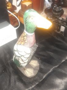 A Beautiful Vintage Duck with pull out Clothes Brush in nice condition
