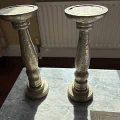 Meadow & Byrne ornamental candle stands.
