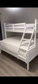 White wooden triple sleeper bunk bed