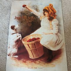 Vintage Style Metal Advertising Sign of a Girl with a Dog
