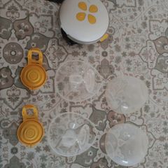 Breast pump ,   medela swing maxi