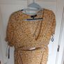 Size 12 Floral set V top and mini skirt Image 6