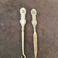 Victorian toilet set consisting of a button hook and a nail file silver 925