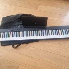 Piano with case