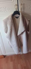 ladies fluffy sleeveless top