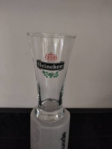 2 half pint Heineken glasses
