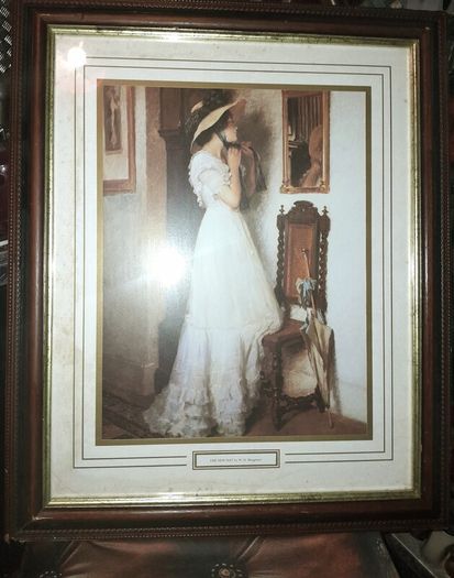 The new hat-picture in wooden frame