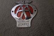 Aa Badge With A Red Background,on offer