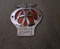 Aa Badge With A Red Background,on offer