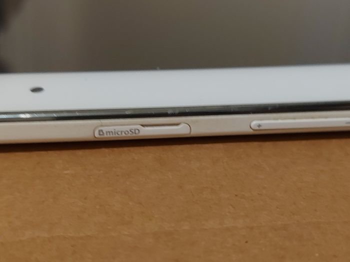 Samsung Galaxy Tab 4, Model SM-T530, 16GB, White, working great, in excellent condition and with a bunch of Family-children  movies