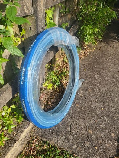 Spool of plumbing pipe.