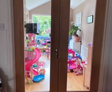 Solid wood internal double doors with clear glass panels