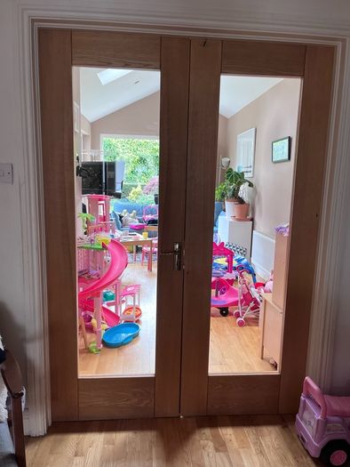 Solid wood internal double doors with clear glass panels