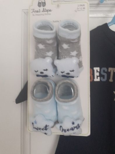 New baby boy bundle with tags .Consists of Addidas tracksuit . Name it top .Hat and gloves .pack of 7 pair socks .2 pair of rattle socks and free sunhat new  and green cable jumper all new  17 euro the lot