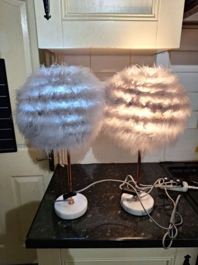 A pair of marble based feather table lamps