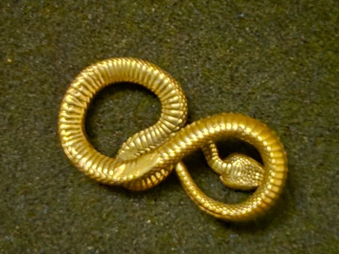 3 brass snakes.