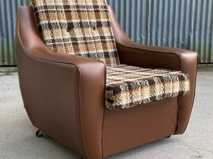 Vintage 1970s armchair on castors.