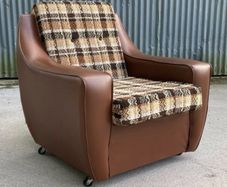 Vintage 1970s armchair on castors.
