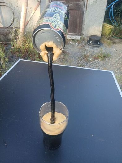 guiness can pouring illusion