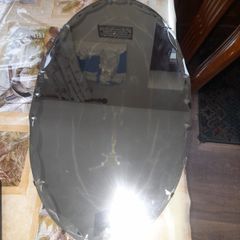 Old Art Deco Oval Frameless Wall Mirror, Scalloped Bevelled border, suspended from a linked metal chain