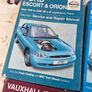 4 Haynes service and repair manuals for various car models. Image 5