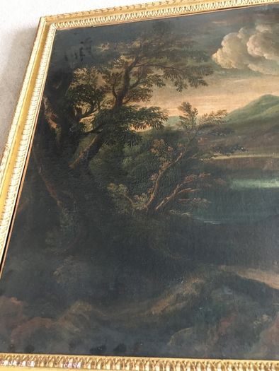 Circle of Francesco Zuccarelli  mountainous landscape by a lake with a fortress