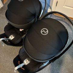 2 x cybex baby seats plus cybex isofix bases (price per set)