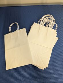 Small white paper bags