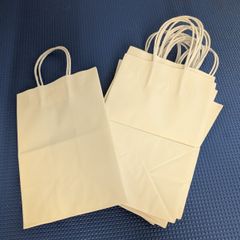 Small white paper bags