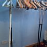 white clothes Rack  features an adjustable height and a built-in shoe rack Image 2