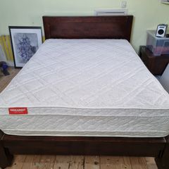 Solid wood double bed frame and deep mattress